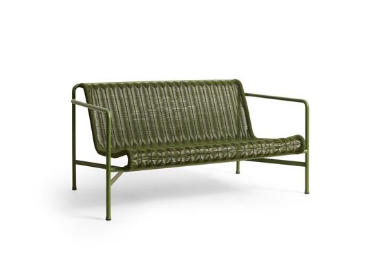 Olivenfarvet sofa med snordetaljer på ryg og sæde, metalrørstel.